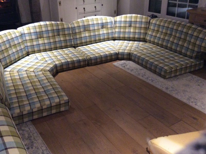 upholstery of caravan lounge set in checked material
